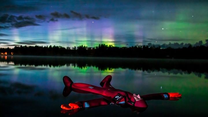 Aurora Floating in Rovaniemi: Watch the Sky from Open Water