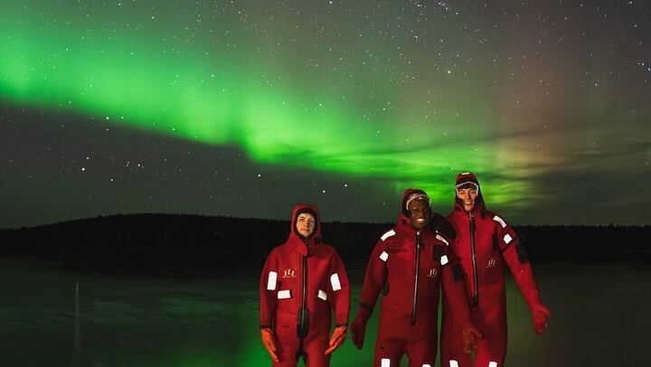 Ice Floating on a Frozen Forest Lake under the Aurora, Rovaniemi (2/5)