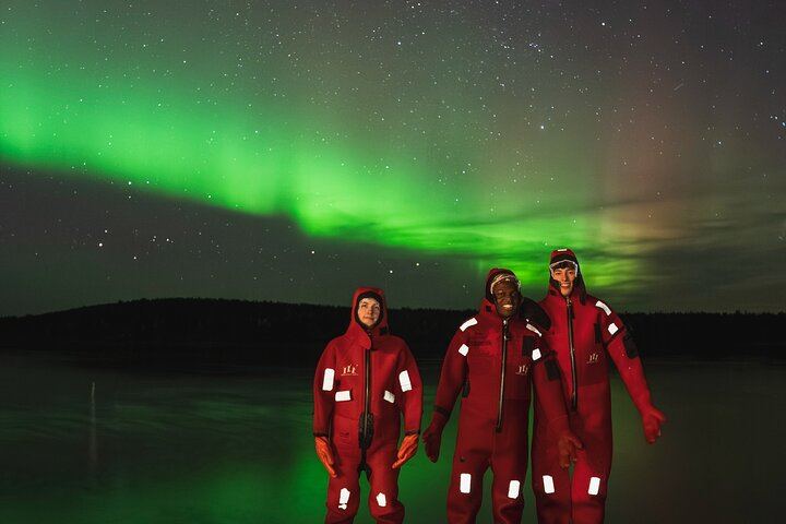 Ice Floating on a Frozen Forest Lake under the Aurora, Rovaniemi (2/5)