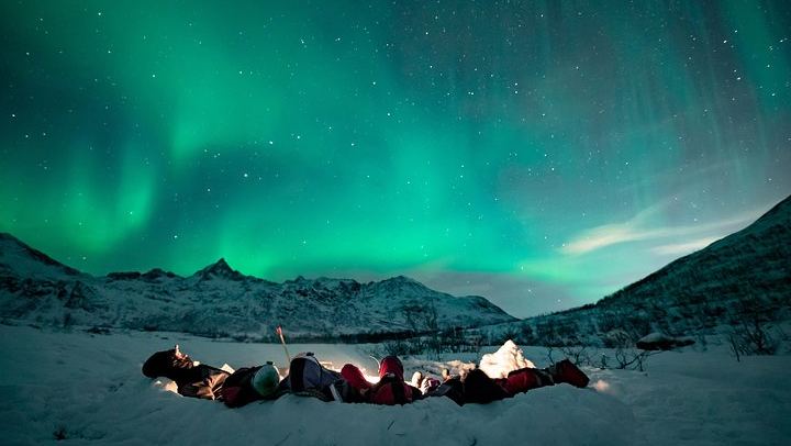 Tromsø Aurora Hunt with Bonfire, Hot Meal, Thermal Suit and Photos