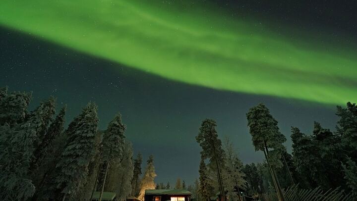 Northern Lights Hunt from a Lappish Cottage in the Forest (1/12)