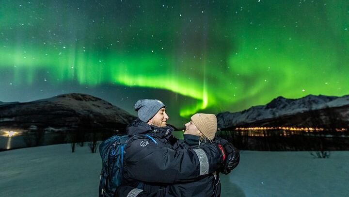 Northern Lights Minibus from Tromso with Photos, Dinner and Warm Suits