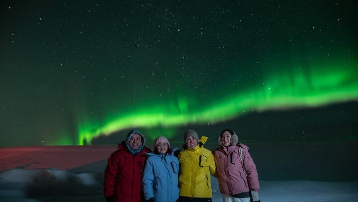 Spirit of the Aurora: Reykjavík Group Tour with a Dedicated Photographer