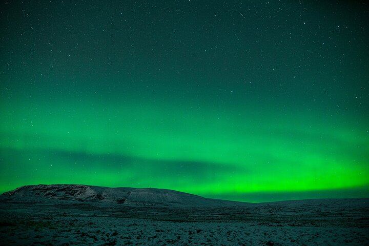 Aube boréale : excursion de groupe à Reykjavík avec un photographe dédié (8/9)