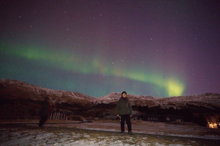 Aube boréale : excursion de groupe à Reykjavík avec un photographe dédié (9/9)