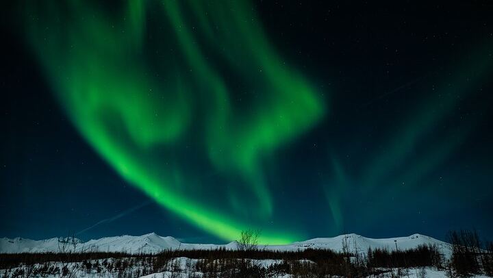 Guided Northern Lights Bus Tour through North Iceland