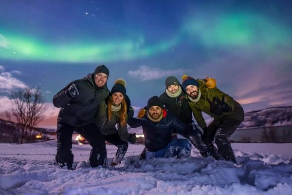 Tromso Northern Lights Tour with Full Arctic Gear and Reindeer Sausage